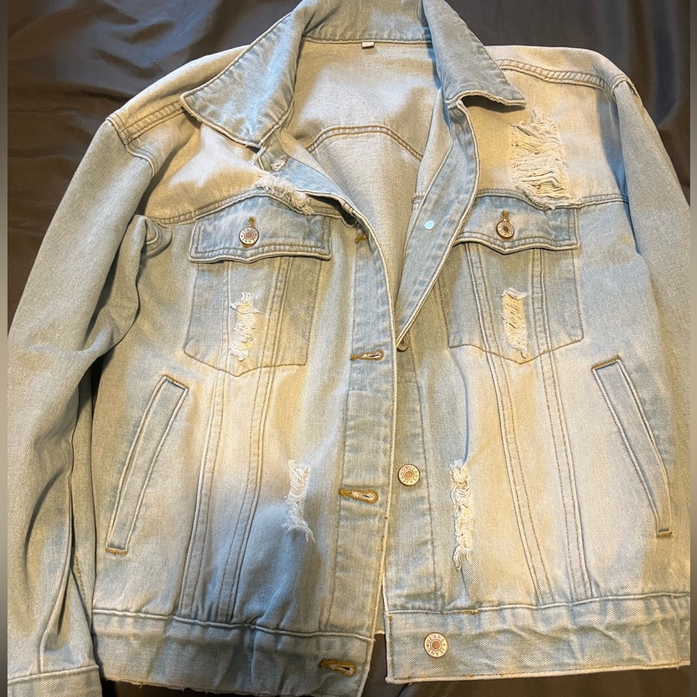 Distressed Jean Jacket. Excellent condition. Size Small.